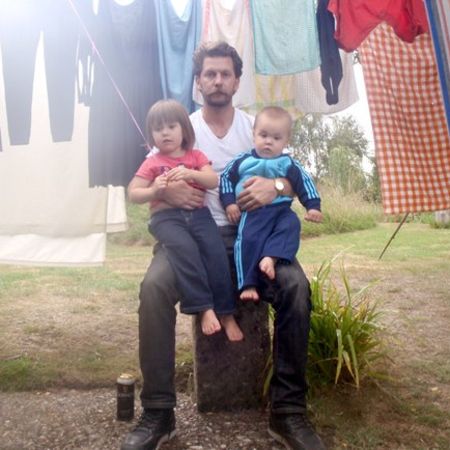 Galvin holding his kids